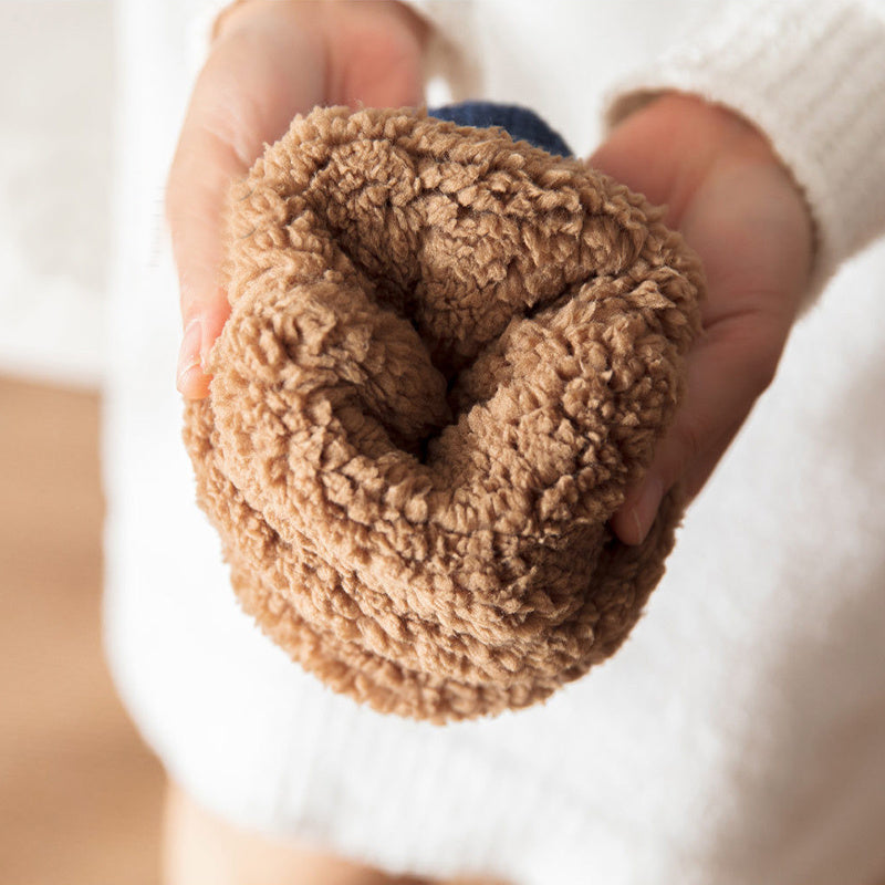 Zachte en dikke winterfootie -sokken met tractieballen