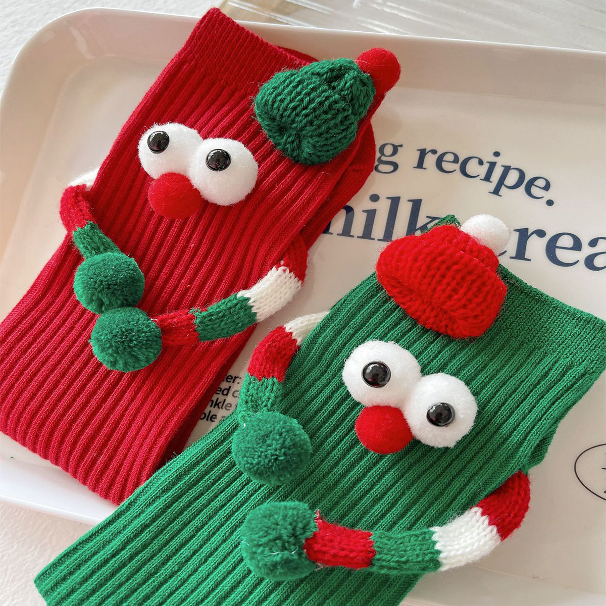 Grillige Googly Eye 3D kerstsokken in rood en groen voor kinderen