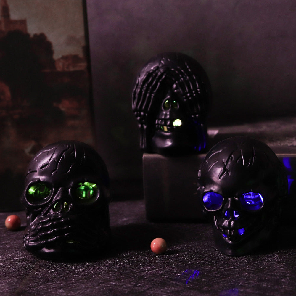 Hear No Evil, See No Evil, Speak No Evil Black Skulls with Lighted Eyes