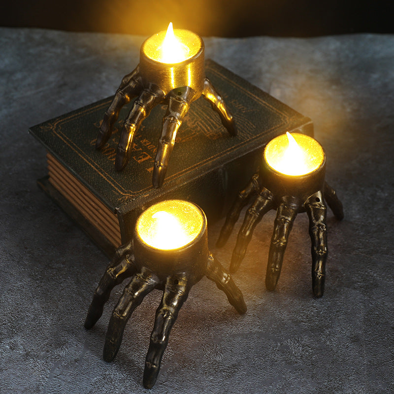 Ontlichaamde hand metaallantaarn met valse vlam Halloween -decoratie