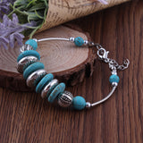 Turquoise and Metal Rings Bracelet
